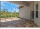 Spacious screened porch overlooking backyard at 6218 Bridleford Dr, Wesley Chapel, FL 33545