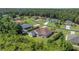 Aerial view of house and surrounding neighborhood at 6218 Bridleford Dr, Wesley Chapel, FL 33545