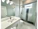 Modern bathroom with quartz countertop and glass shower at 6218 Bridleford Dr, Wesley Chapel, FL 33545