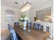 Elegant dining room featuring a stylish chandelier, mirror and tasteful decor at 33724 Americana Ave, Dade City, FL 33525