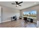 Spacious home office with large window overlooking water views at 5243 Wishing Arch Dr, Apollo Beach, FL 33572