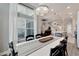 Open concept dining room with view into living room and kitchen at 5243 Wishing Arch Dr, Apollo Beach, FL 33572
