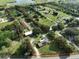 Expansive aerial view of property with a large lot, pool, and several structures at 12922 672 Hwy, Riverview, FL 33579