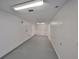 Partially finished basement space with ample room for storage at 12922 672 Hwy, Riverview, FL 33579