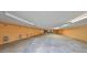 Large basement with ample storage, numbers on wall and gray concrete flooring at 12922 672 Hwy, Riverview, FL 33579
