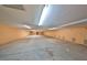 Wide basement with ample storage, and gray concrete flooring at 12922 672 Hwy, Riverview, FL 33579