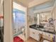 Bathroom featuring a vanity with a sink and a shower with a curtain at 12922 672 Hwy, Riverview, FL 33579