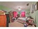 Bedroom with a ceiling fan and curtains at 12922 672 Hwy, Riverview, FL 33579