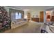 Comfortable living room featuring neutral colors and a large window at 12922 672 Hwy, Riverview, FL 33579
