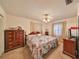 Cozy bedroom with a ceiling fan and warm, natural lighting at 12922 672 Hwy, Riverview, FL 33579