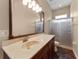Bathroom featuring a vanity with marble countertop and a glass-enclosed shower at 614 Vintage Way, Brandon, FL 33511