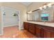 Large bathroom boasts tile floors, double vanity, and doorway to walk-in closet at 614 Vintage Way, Brandon, FL 33511
