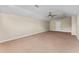 Large bonus room featuring neutral carpet, ceiling fan, and natural light at 614 Vintage Way, Brandon, FL 33511