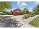 Stunning home featuring brick driveway, lush landscaping, and a well-maintained lawn at 614 Vintage Way, Brandon, FL 33511