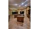 Spacious kitchen with central island and decorative lighting at 614 Vintage Way, Brandon, FL 33511