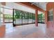 Covered lanai featuring tile flooring and a scenic backyard view at 614 Vintage Way, Brandon, FL 33511