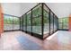 Large covered lanai with tile flooring and screened enclosure at 614 Vintage Way, Brandon, FL 33511