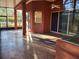 Bright sunroom with tiled floor, ceiling fan, and large sliding glass doors at 614 Vintage Way, Brandon, FL 33511