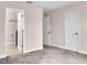 Bedroom with plush carpeting, neutral walls, and white trim at 11522 Cambium Crown Dr, Riverview, FL 33569