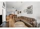 Spacious living room with leather couch and view of kitchen at 1120 E Kennedy Blvd # 827, Tampa, FL 33602