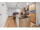 Modern kitchen with granite island and stainless steel appliances at 1120 E Kennedy Blvd # 827, Tampa, FL 33602
