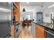 Open concept kitchen with stainless steel appliances and granite island at 1120 E Kennedy Blvd # 827, Tampa, FL 33602