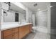 Updated bathroom with a bathtub and modern vanity at 1120 E Kennedy Blvd # 827, Tampa, FL 33602