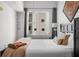 Comfortable bedroom with a large bed and window with city view at 1120 E Kennedy Blvd # 827, Tampa, FL 33602
