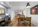 Bright dining area with table, chairs, and view of kitchen at 1120 E Kennedy Blvd # 827, Tampa, FL 33602