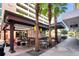 Outdoor patio with tables and chairs at 1120 E Kennedy Blvd # 827, Tampa, FL 33602