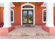 Double front doors with decorative glass and tile flooring at 614 Vintage Way, Brandon, FL 33511