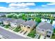 Townhome community with lake and lush landscaping at 9107 Moonlit Meadows Loop, Riverview, FL 33578