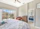 Main bedroom with access to additional sitting area at 9107 Moonlit Meadows Loop, Riverview, FL 33578