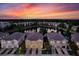 Townhomes at sunset, near a tranquil lake at 9107 Moonlit Meadows Loop, Riverview, FL 33578