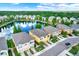 Townhomes near a lake, showcasing a desirable location at 9107 Moonlit Meadows Loop, Riverview, FL 33578