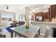 Open living room with a comfy sofa and large windows at 9107 Moonlit Meadows Loop, Riverview, FL 33578