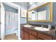 Bathroom with double vanity and a shower/tub combo at 9107 Moonlit Meadows Loop, Riverview, FL 33578