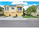 Two-story townhome with a two-car garage and a balcony at 9107 Moonlit Meadows Loop, Riverview, FL 33578