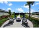 Community fire pit with seating for gatherings at 3778 Maxwell Park Dr, Sun City Center, FL 33573