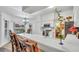 Bright kitchen features stainless steel appliances and white cabinetry at 12711 Royal George Ave, Odessa, FL 33556