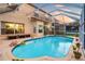 Inviting screened pool with plenty of space for relaxation at 12711 Royal George Ave, Odessa, FL 33556