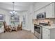 Kitchen with stainless steel appliances and a breakfast nook at 12711 Royal George Ave, Odessa, FL 33556