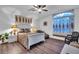 Main bedroom with large window and ensuite bathroom at 12711 Royal George Ave, Odessa, FL 33556