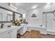 Spa-like bathroom with soaking tub, shower and double vanity at 12711 Royal George Ave, Odessa, FL 33556