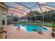 Relaxing screened pool and patio area, ideal for summer fun at 12711 Royal George Ave, Odessa, FL 33556