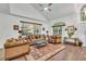 Open living room with vaulted ceilings and hardwood floors at 12711 Royal George Ave, Odessa, FL 33556