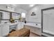 Bathroom with double vanity, soaking tub and shower at 12711 Royal George Ave, Odessa, FL 33556