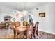 Elegant dining room with ornate wood furniture at 12711 Royal George Ave, Odessa, FL 33556