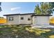 House exterior and backyard with a fence at 5061 Jasmine Cir, St Petersburg, FL 33714