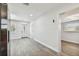 Light and airy entryway with wood-look flooring and an open concept at 5061 Jasmine Cir, St Petersburg, FL 33714